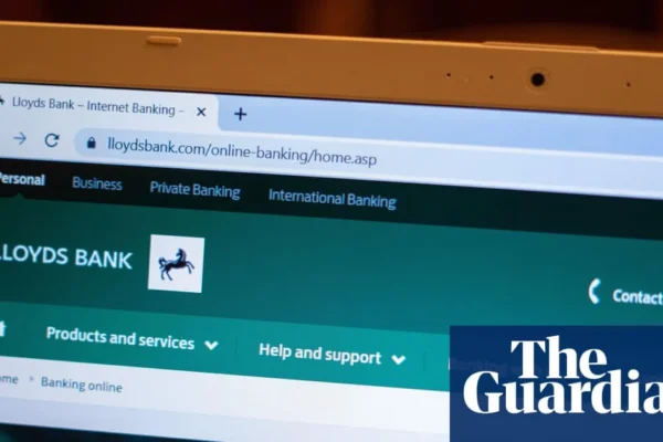 Lloyds Bank branch sign with a complaint about delayed church funds
