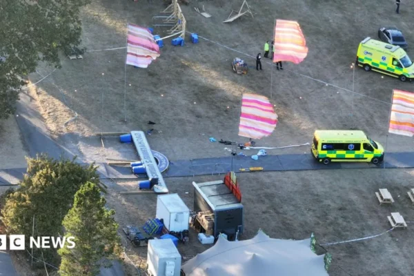 Emergency response at a Christian festival site after a large sign fell