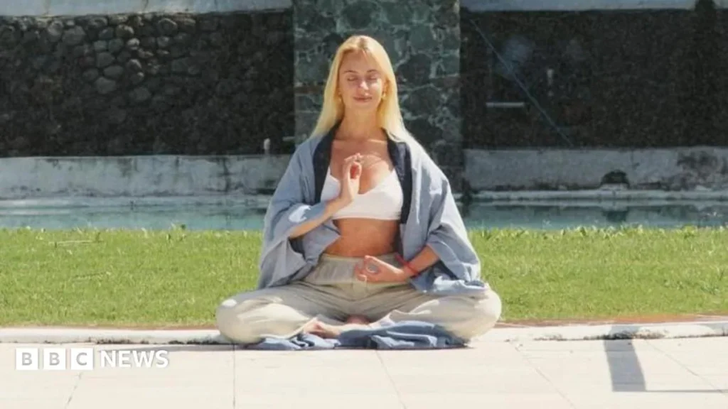 People doing yoga in a park as part of a low-cost wellness meet-up