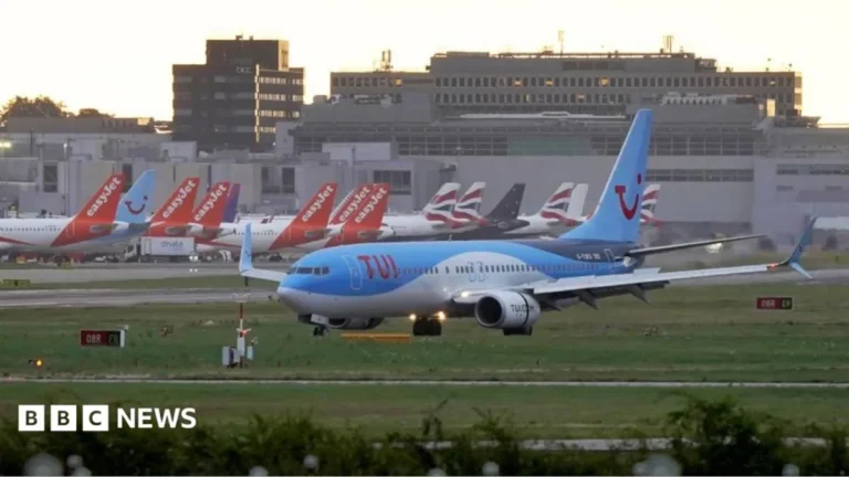 Passengers at Gatwick Airport during a water supply outage affecting terminal facilities