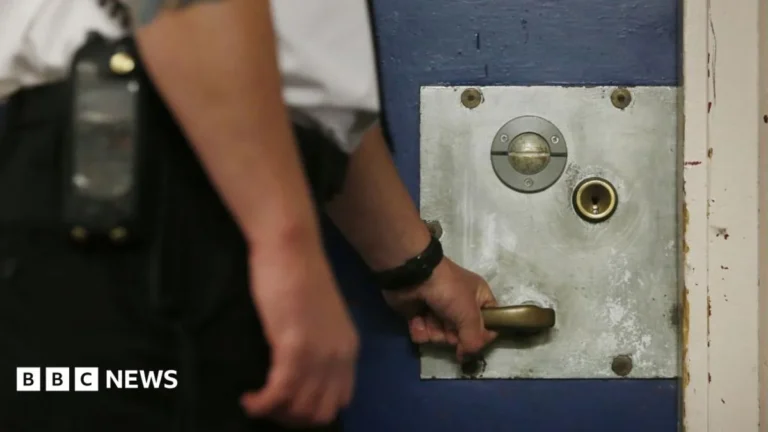 A prison wing corridor in England as the government phases in early releases