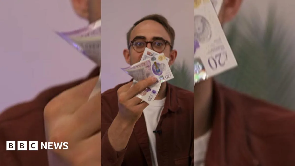 A person holding a credit card while checking refund details on a phone