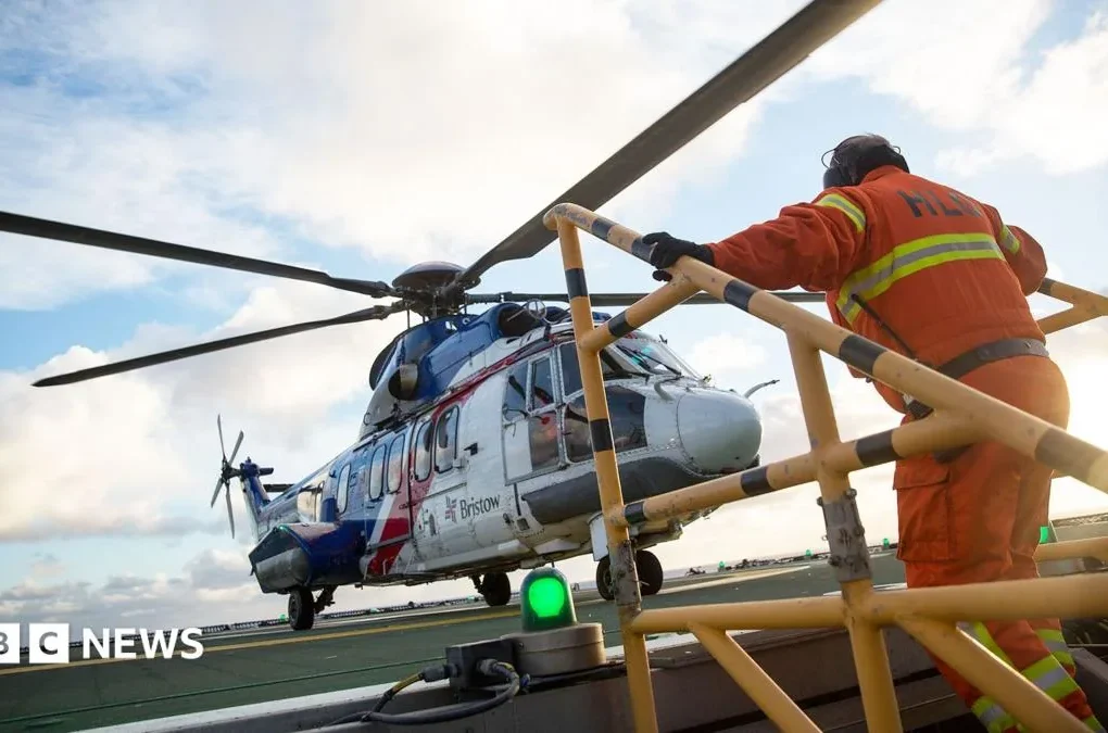 Offshore workers boarding a helicopter for travel to North Sea installations
