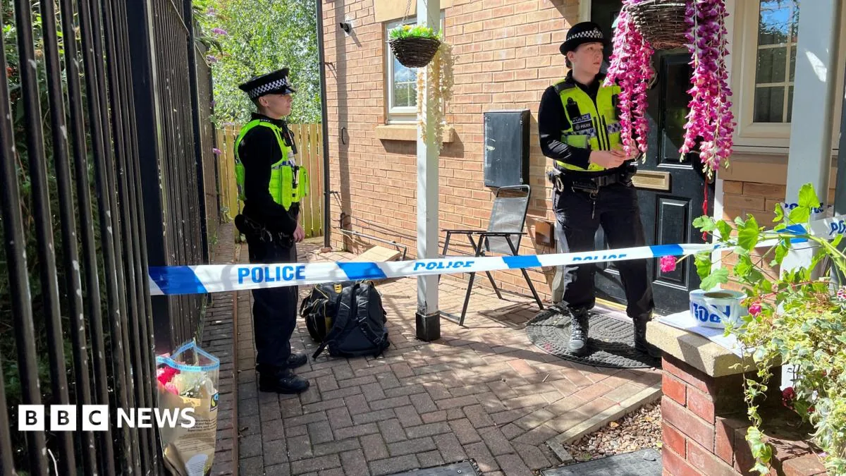Police outside a house in Holywell Heights in Sheffield after a baby girl died