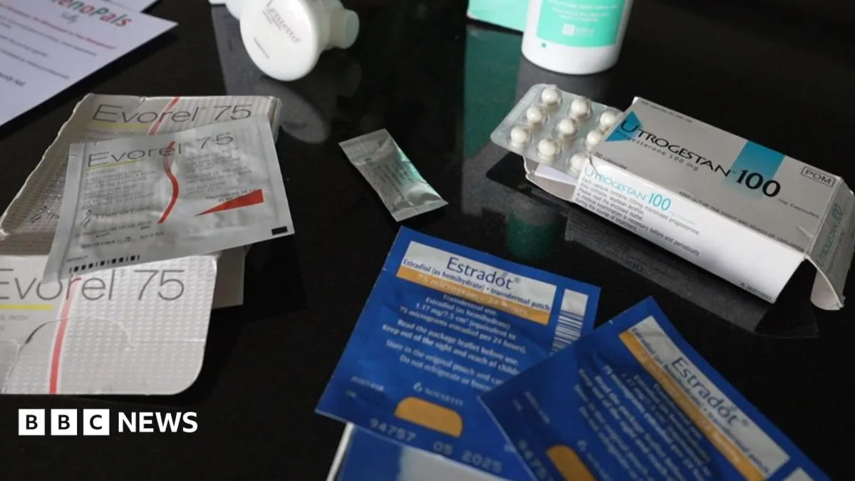 A woman holds a hormone prescription bottle while discussing menopause treatment